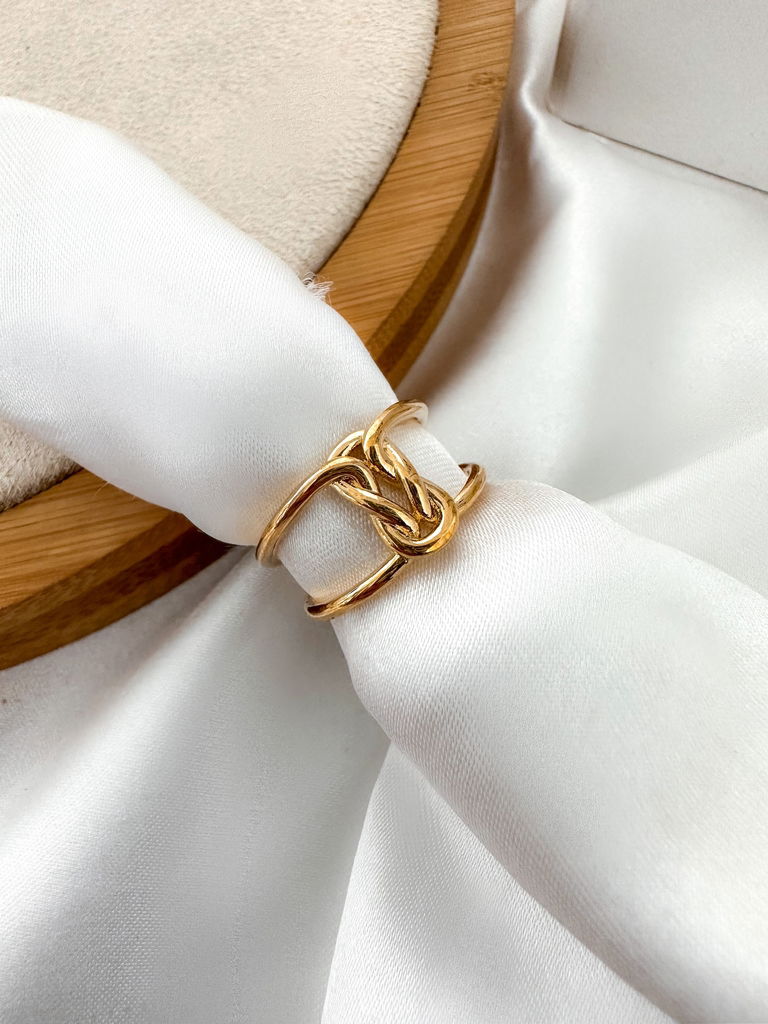 Anel folheado a ouro 18k e prata com detalhe entrelaçado