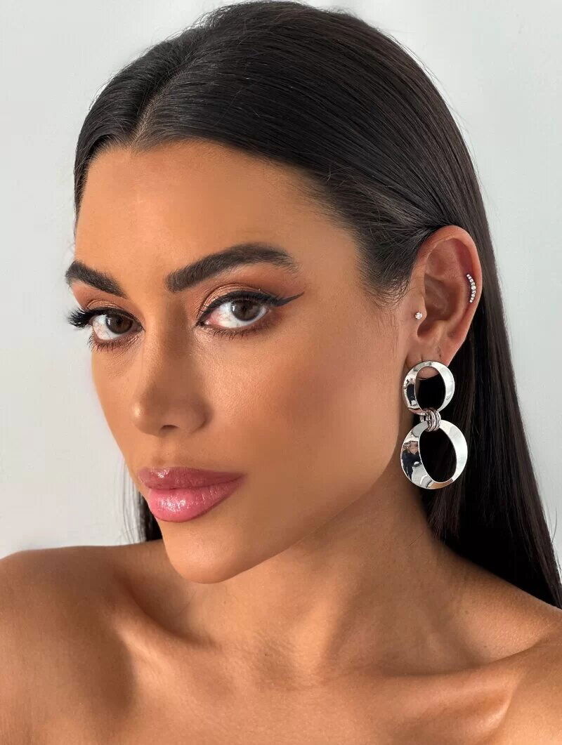 Brinco Folheado a Ouro 18K e a Prata Círculos Vazados.