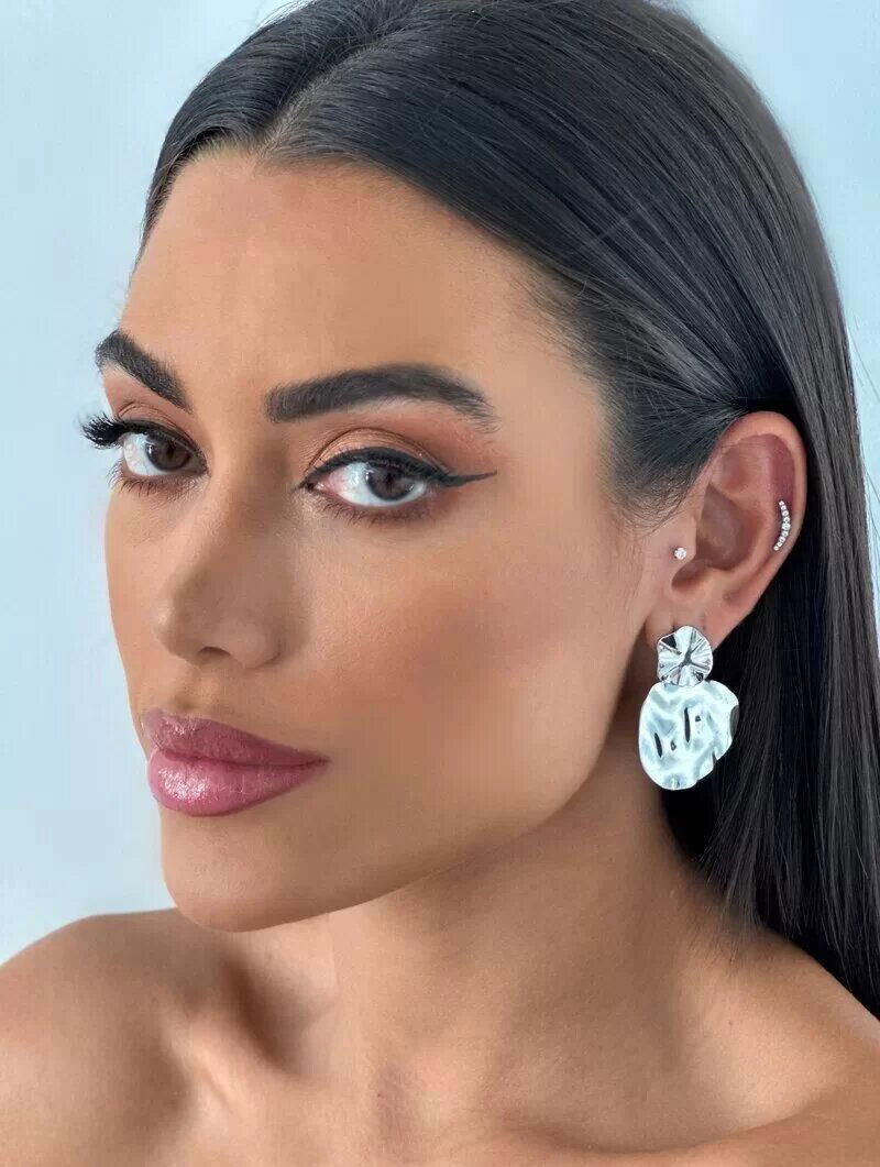 Brinco Folheado a Ouro 18K e a Prata Ponteira Orgânica.