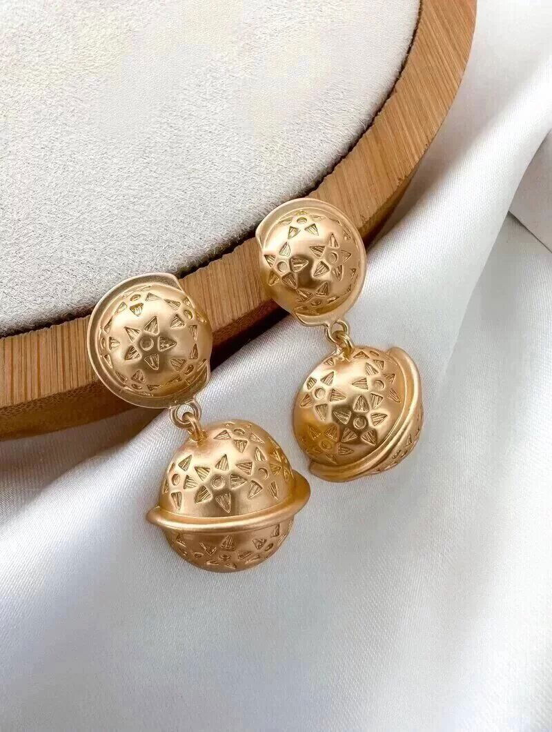 Brinco Folheado a Ouro 18k e Prata Circulos Trabalhados