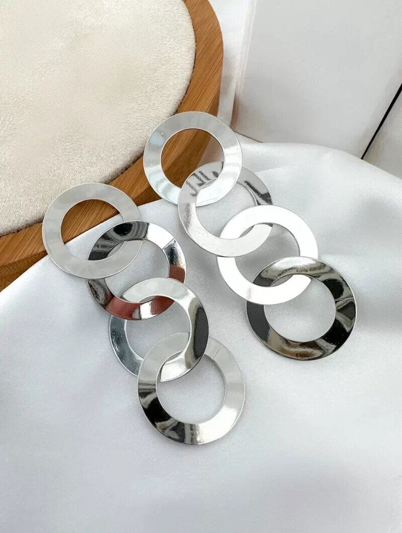 BRINCO FOLHEADO A OURO 18K E PRATA CIRCULOS VAZADOS