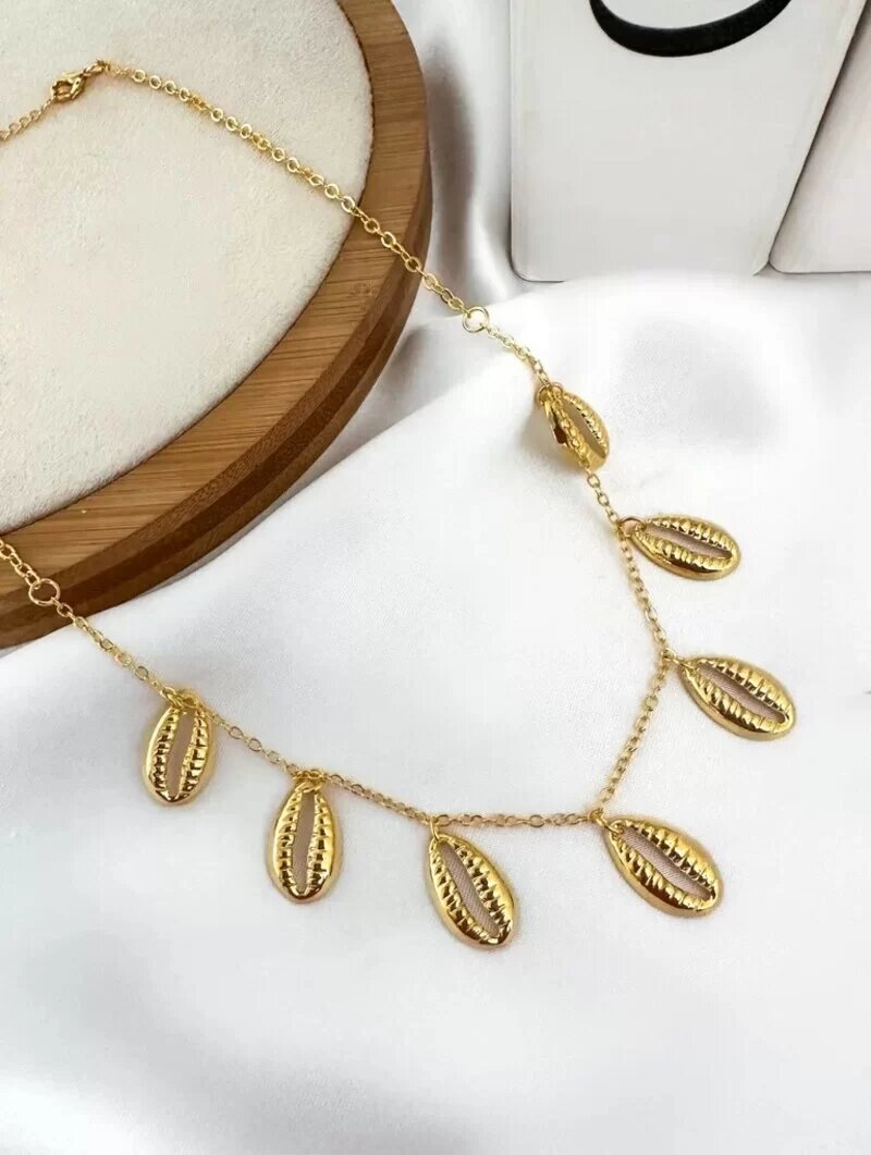 Choker de búzios folheada a ouro