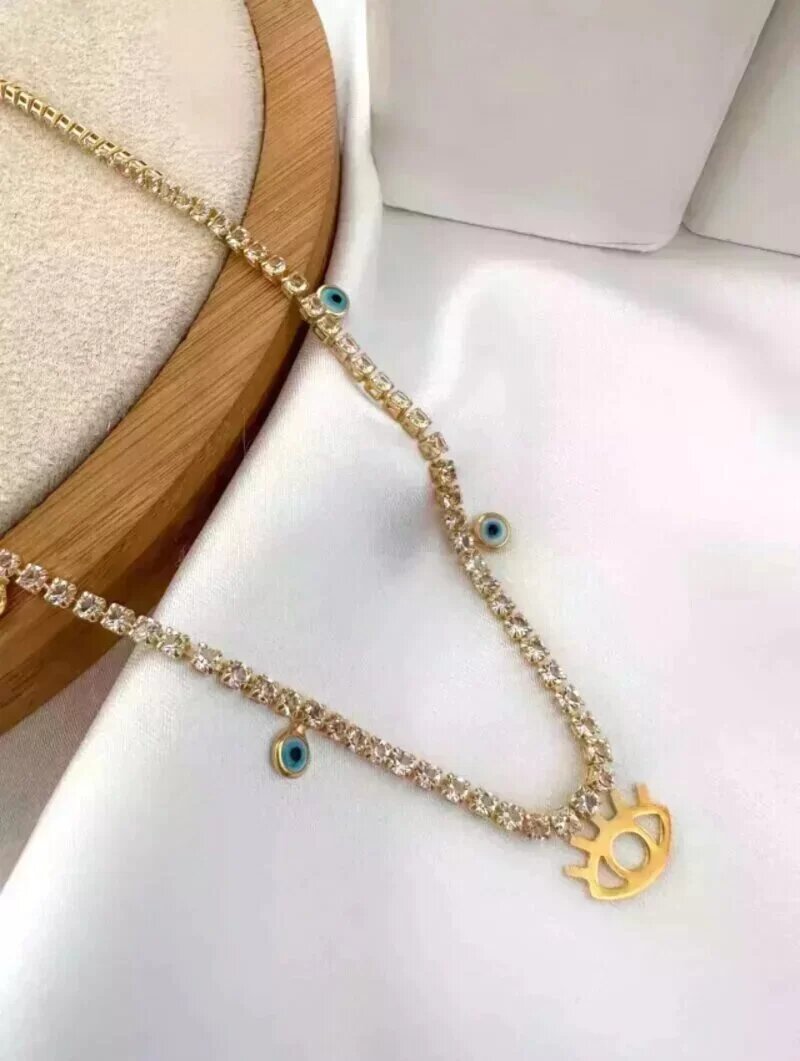 Choker zircônias folheado a ouro 18k olho grego.
