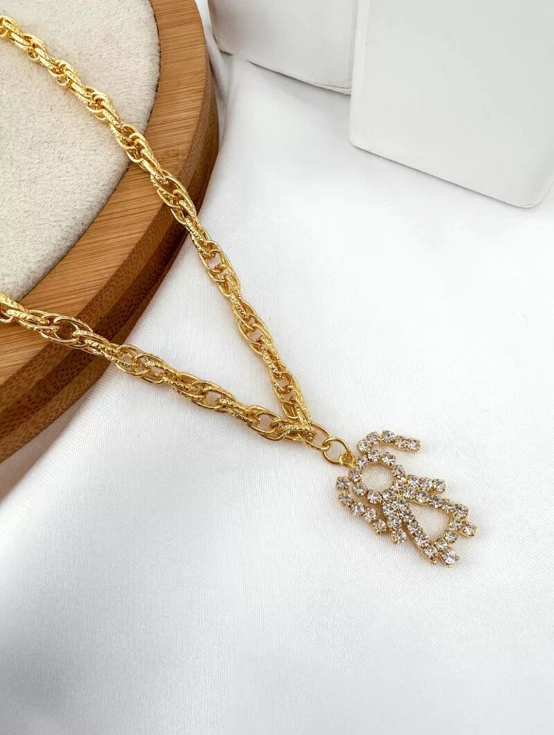 Colar menina com zircônias folheado a ouro 18k.