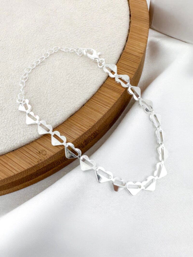 Pulseira coração vazado folheado a ouro 18k e prata 925.