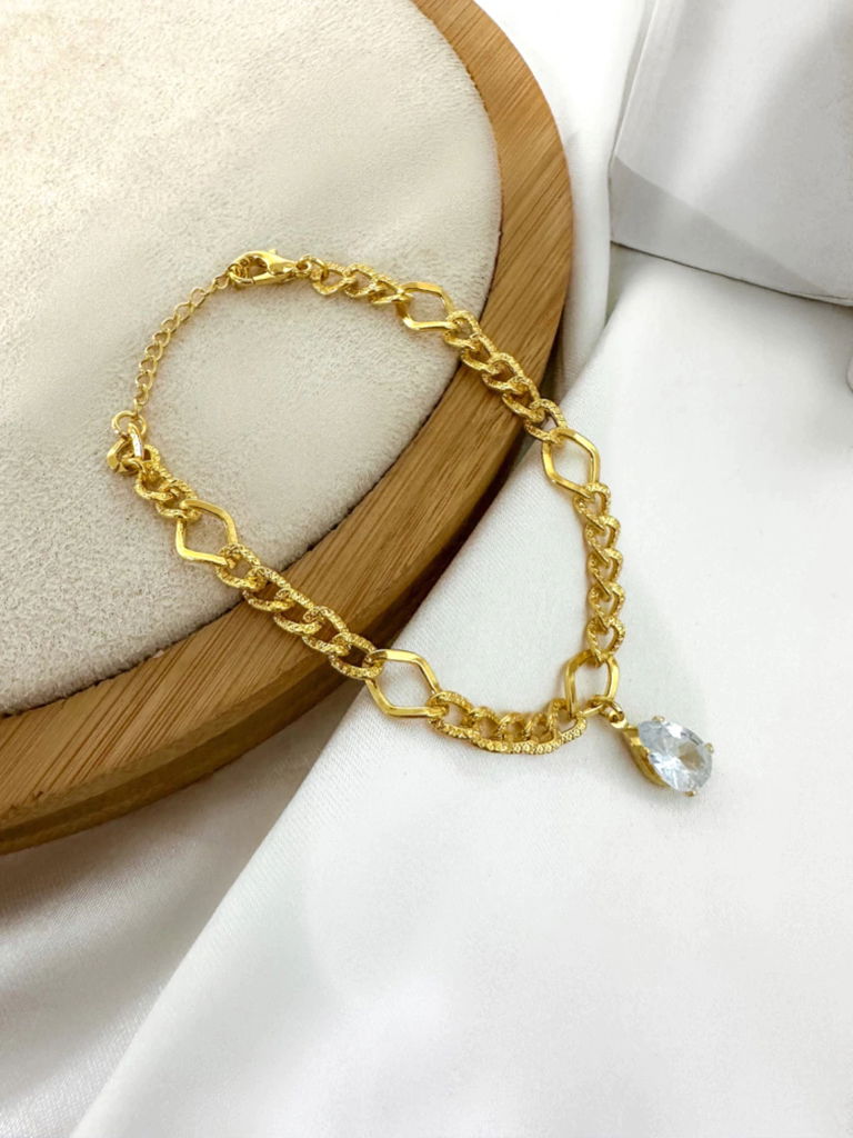 Pulseira elos trabalhado com gota de luz folheada a ouro 18k e prata 925.