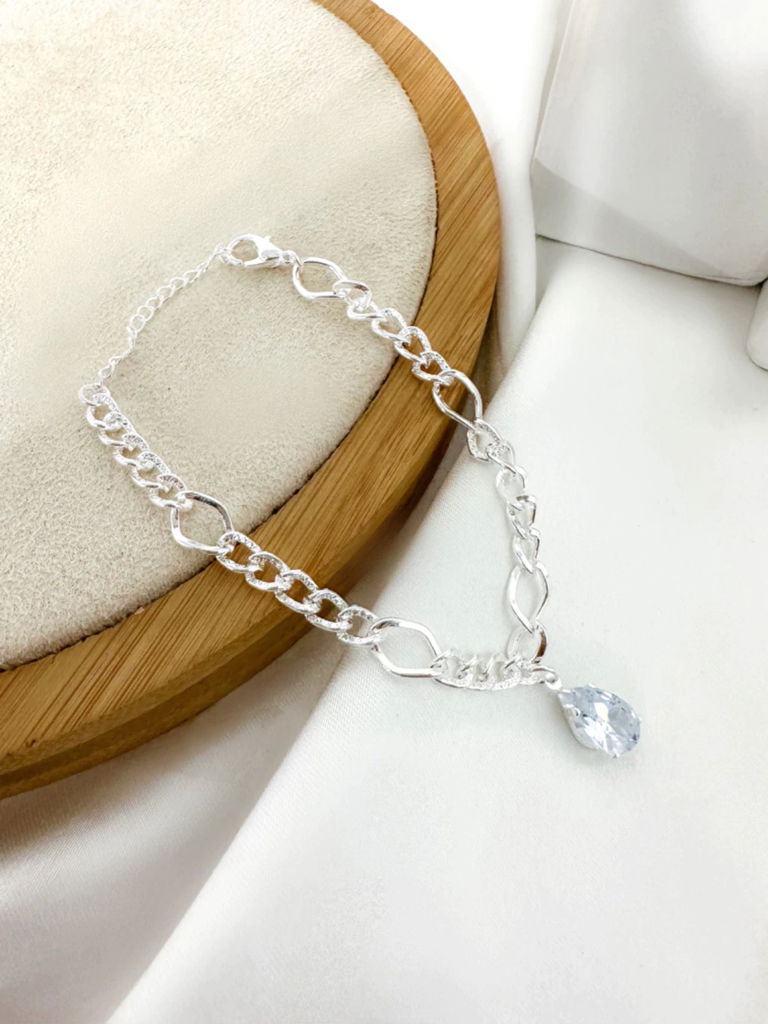 Pulseira elos trabalhado com gota de luz folheada a ouro 18k e prata 925.