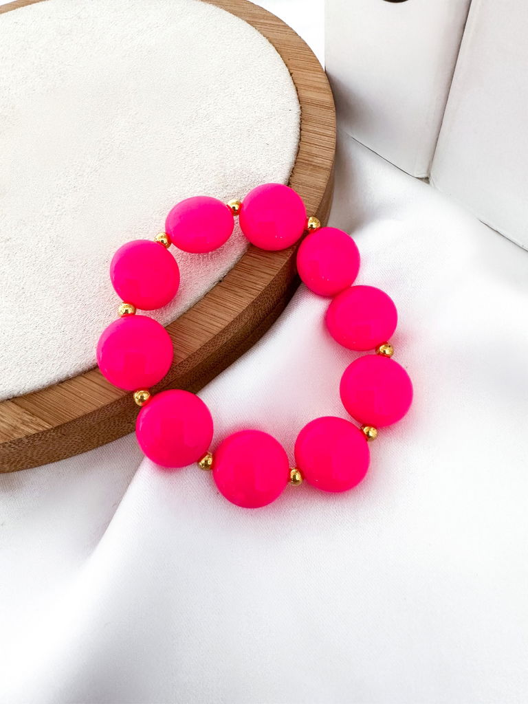 Pulseira esferas achatadas com entre meio douradas