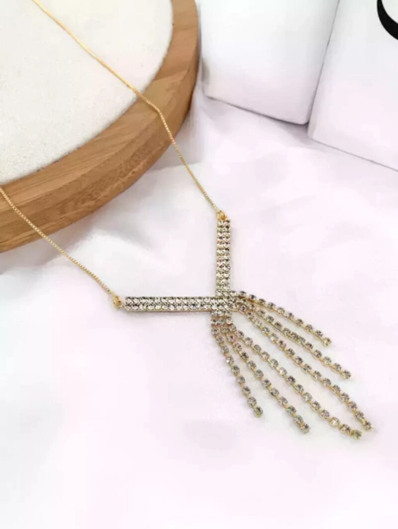 Veneziana folheada a ouro pingente lariat em micro zircônias.